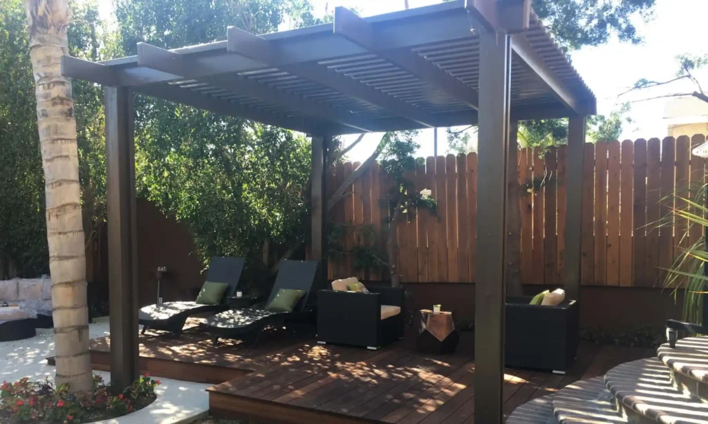 well-crafted pergola in a tropical-style backyard lounge