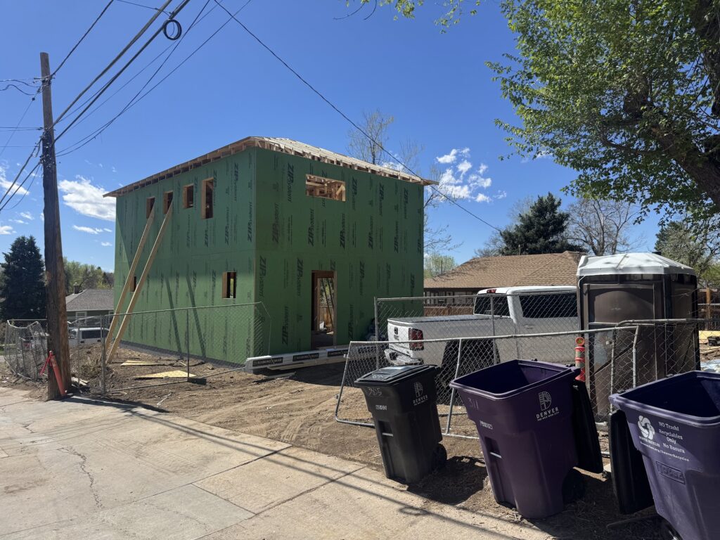 Colorado mountain home under construction showing hardened roof and sheathing
